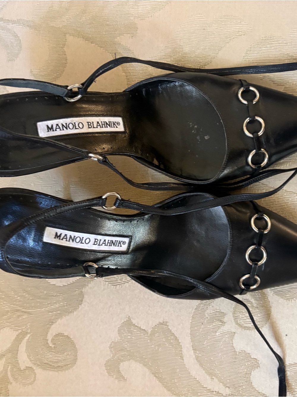 Manolo Blahnik Black Leather Slingback Heels with Silver Ring Accents